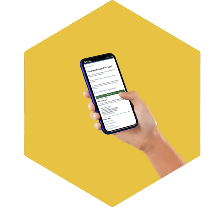 The phone screen displays a UK government webpage includes search instruction or links related to C&K Heating and Renewables tax band